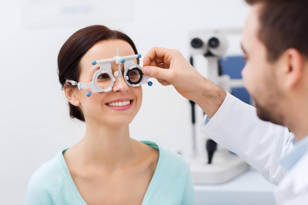 reading glasses, presbyopia woman at eye doctor trial frame